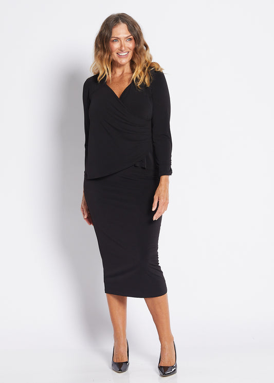 Tina Foundation slinky jersey midi tube skirt in black