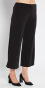 Black wide-leg pants worn by a person on a white background