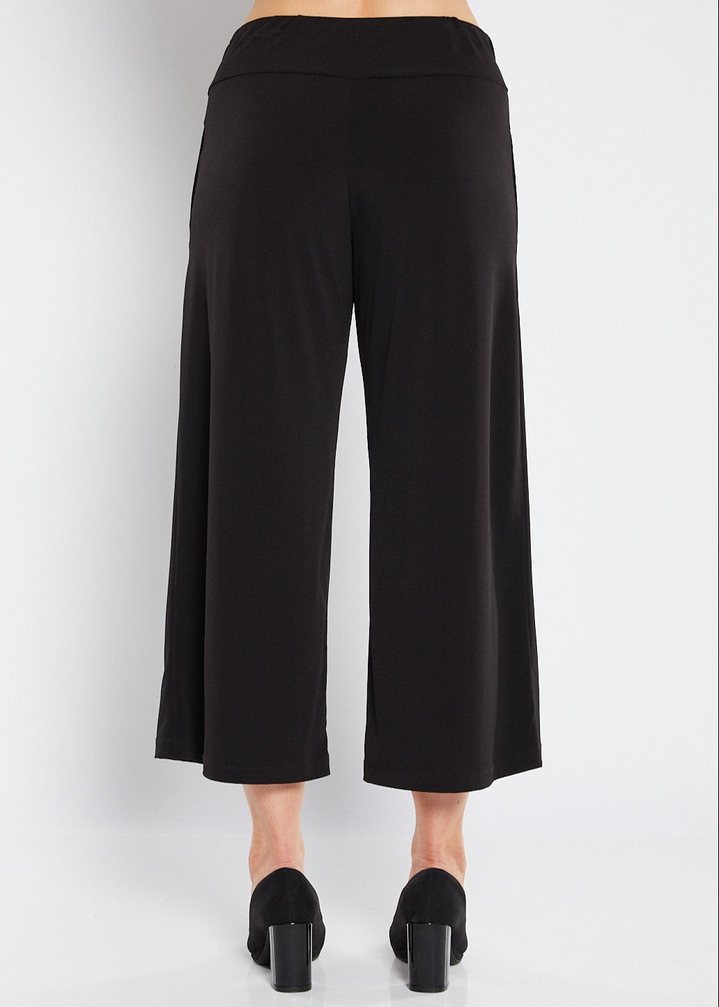 Black wide-leg pants on a white background