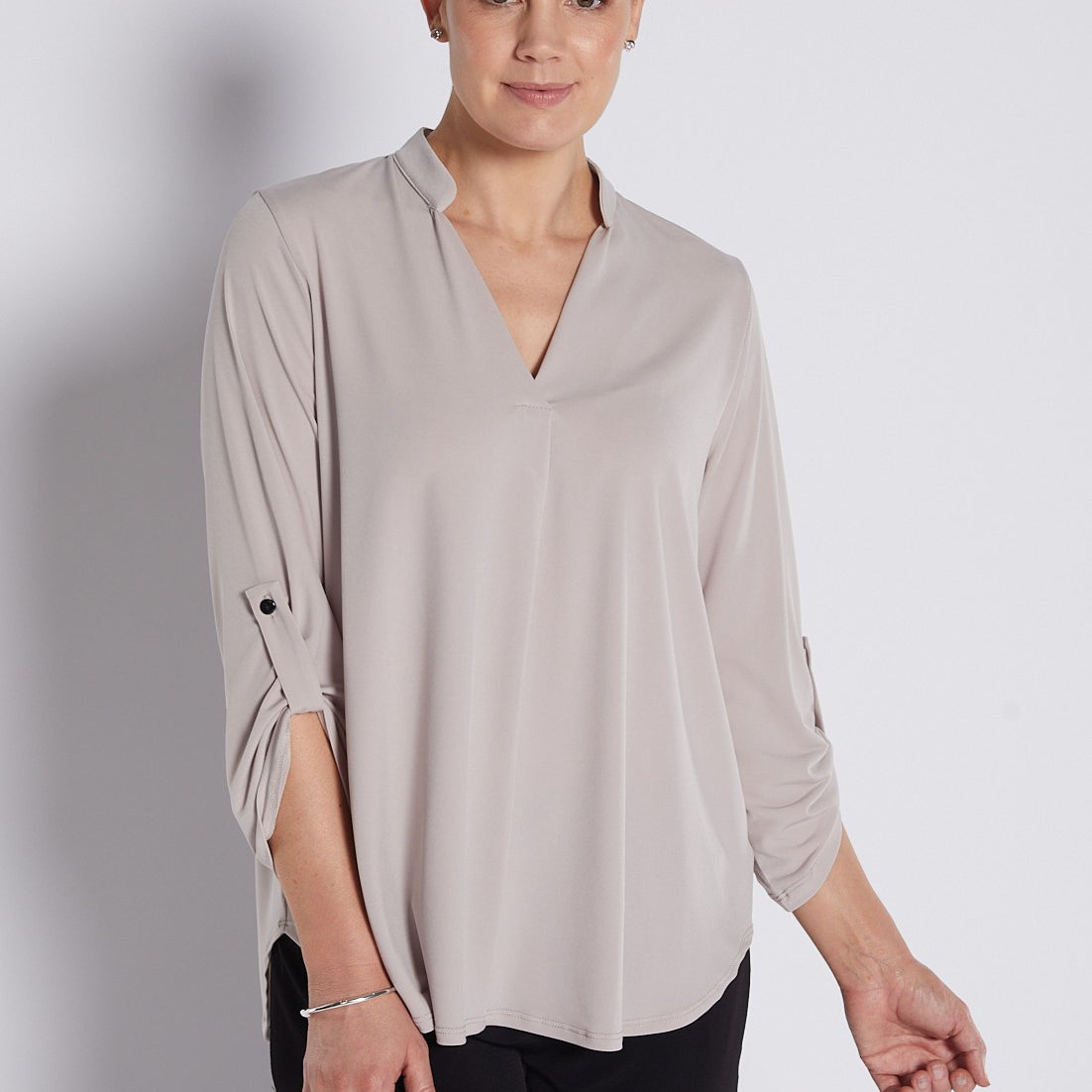 Jersey Nehru Collar V Neck Tabbed Sleeve Blouse in Champagne