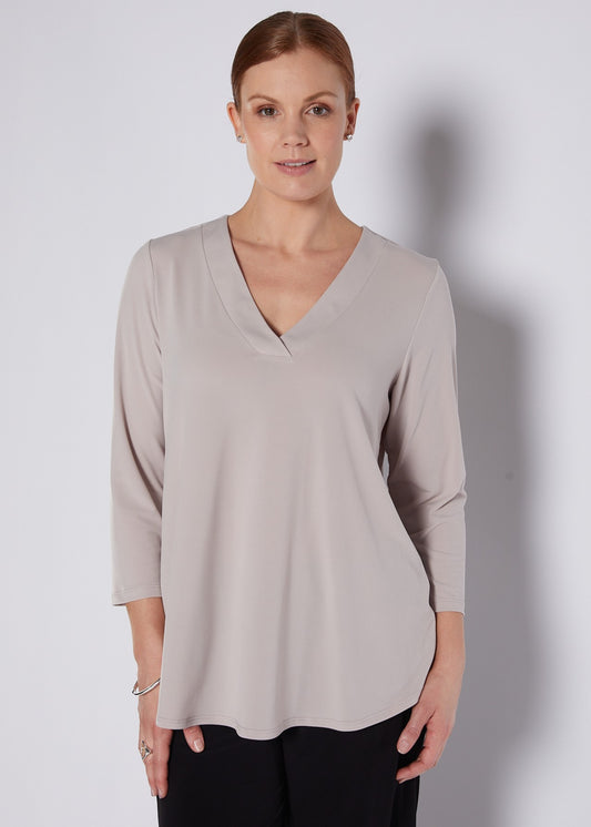 Milla Foundation slinky jersey V neck swing top in champagne