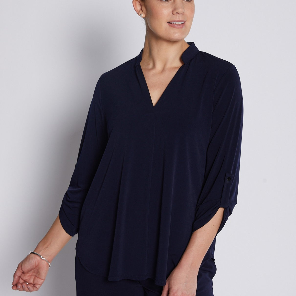 Jersey Nehru Collar V Neck Tabbed Sleeves Blouse in Navy