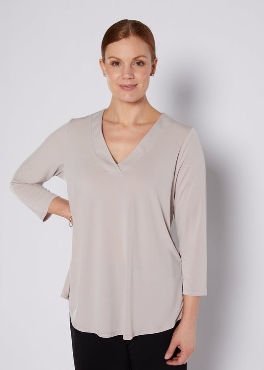 Milla Foundation slinky jersey V neck swing top in champagne