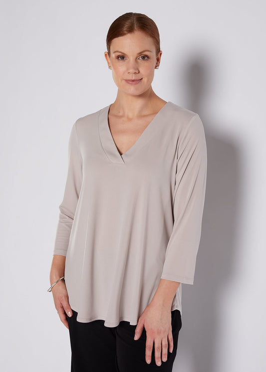 Milla Foundation slinky jersey V neck swing top in champagne