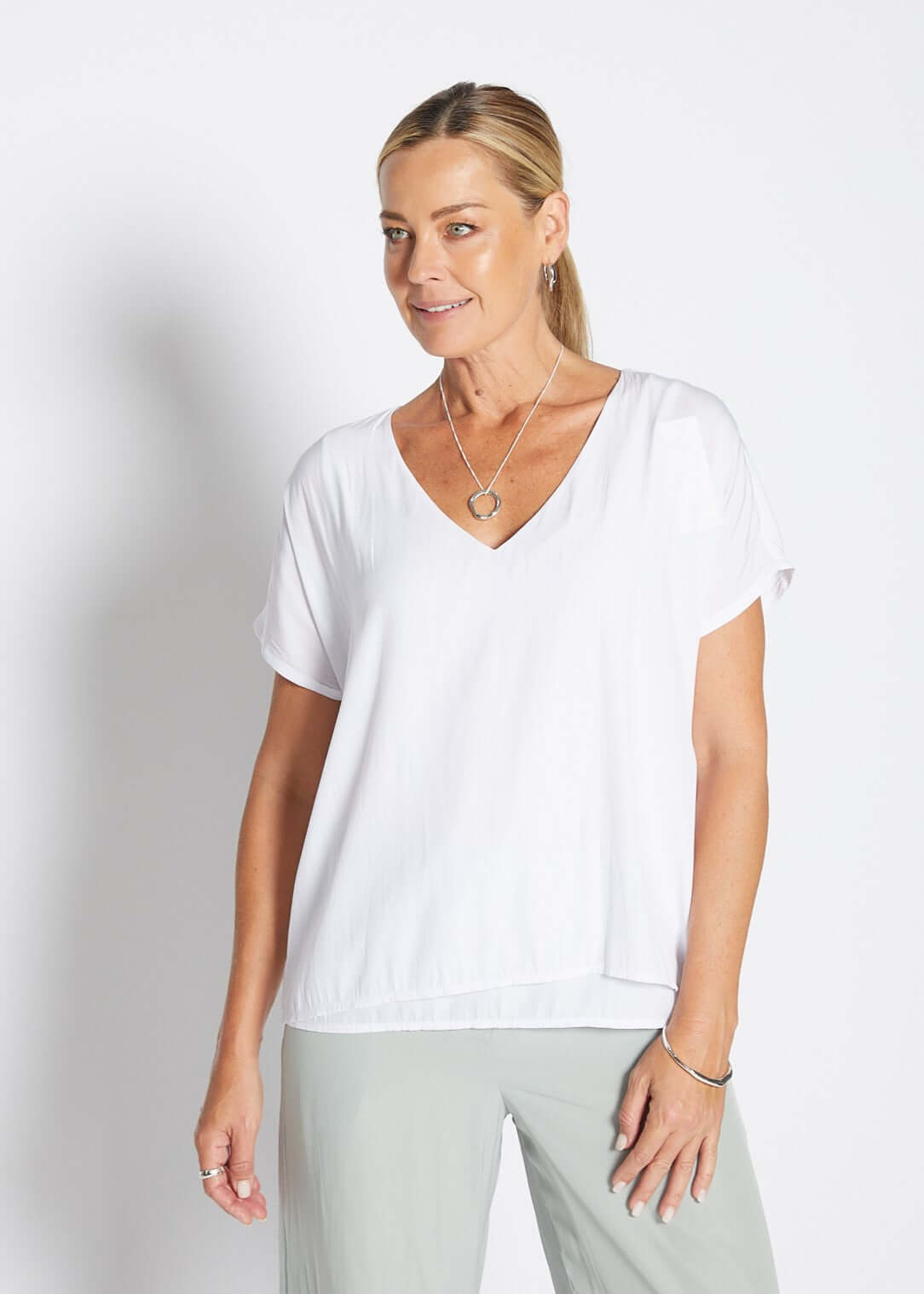Dolly Lustre technical reversible layered top in white
