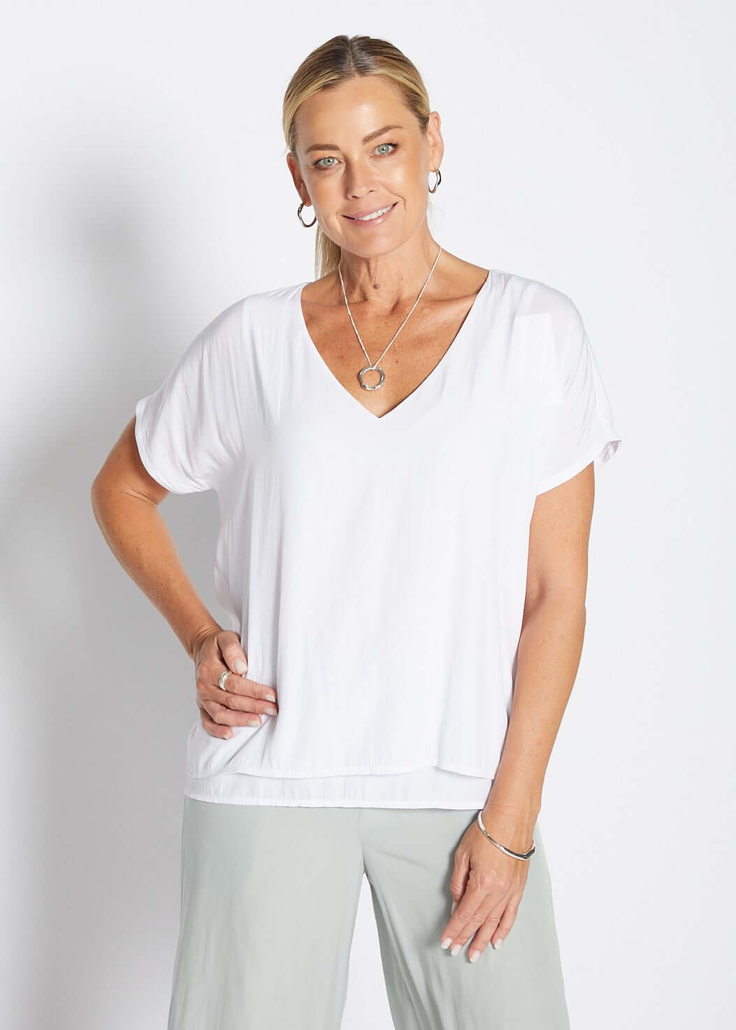 Dolly Lustre technical reversible layered top in white