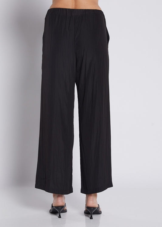 Violin Lustre technical wide leg pants in black