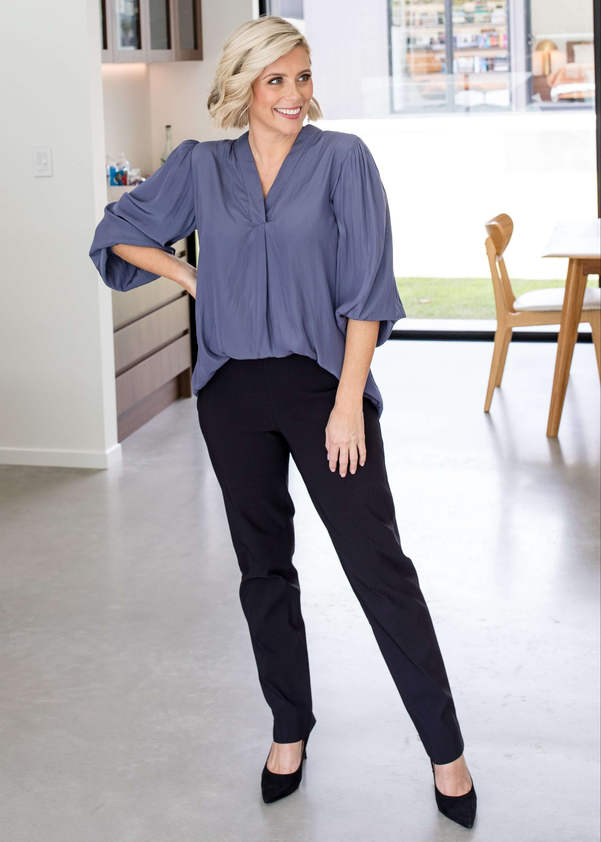 Narrow Miracle Bengaline Women's full length slim cut black pants.