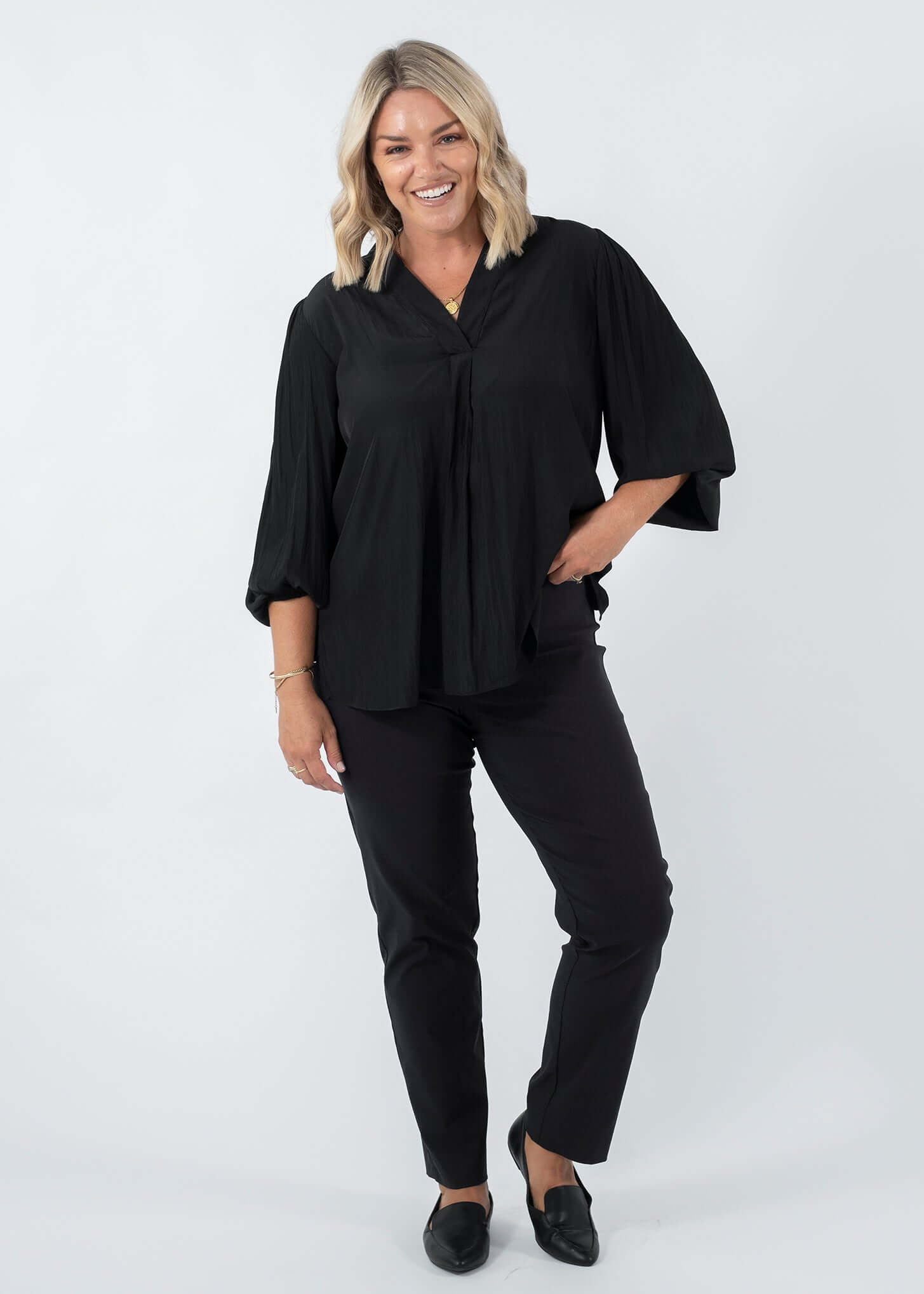 Narrow Miracle Bengaline Women's full length slim cut black pants.