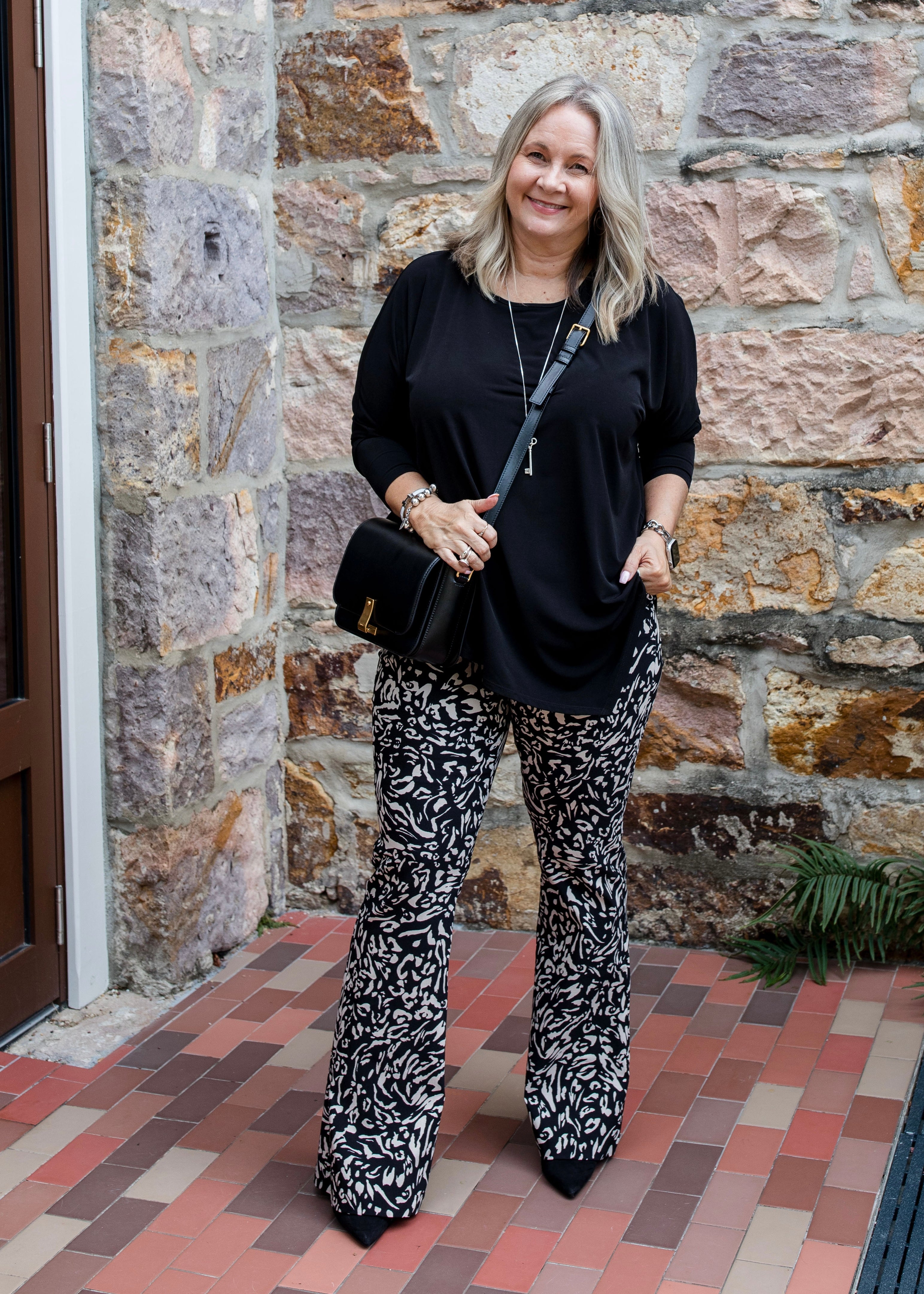 Slope Asymmetric Foundation Jersey Women's Tunic with a scoop neckline in black.