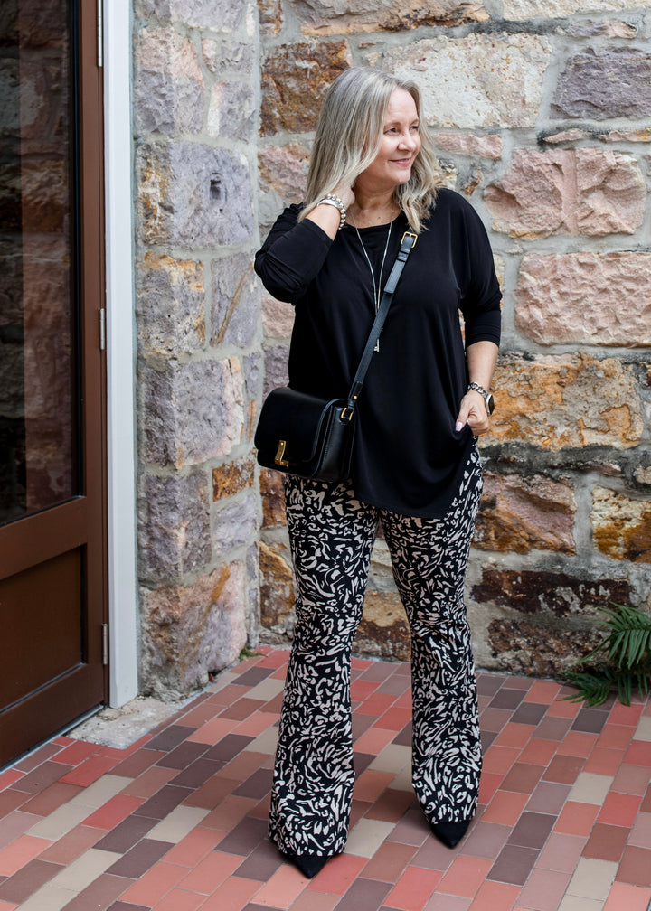 Slope Asymmetric Foundation Jersey Women's Tunic with a scoop neckline in black.