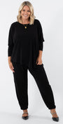 Slope Asymmetric Foundation Jersey Women's Tunic with a scoop neckline in black.
