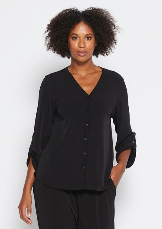 Uber Foundation Jersey Women's Button-down Blouse with a v-neckline in black.
