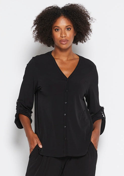 Uber Foundation Jersey Women's Button-down Blouse with a v-neckline in black.