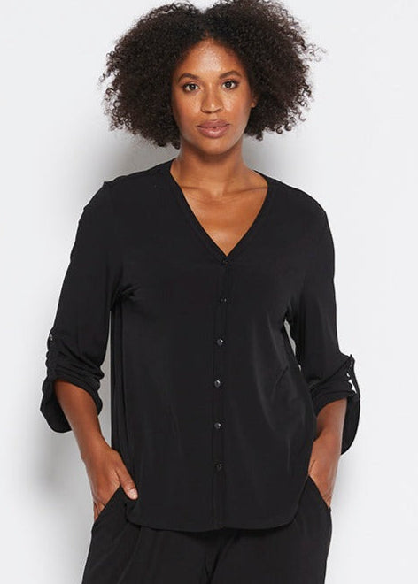 Uber Foundation Jersey Women's Button-down Blouse with a v-neckline in black.