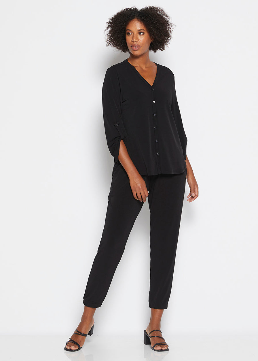 Uber Foundation Jersey Women's Button-down Blouse with a v-neckline in black.