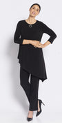 Woman wearing a black outfit on a white background