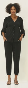 Uber Foundation Jersey Women's Button-down Blouse with a v-neckline in black.