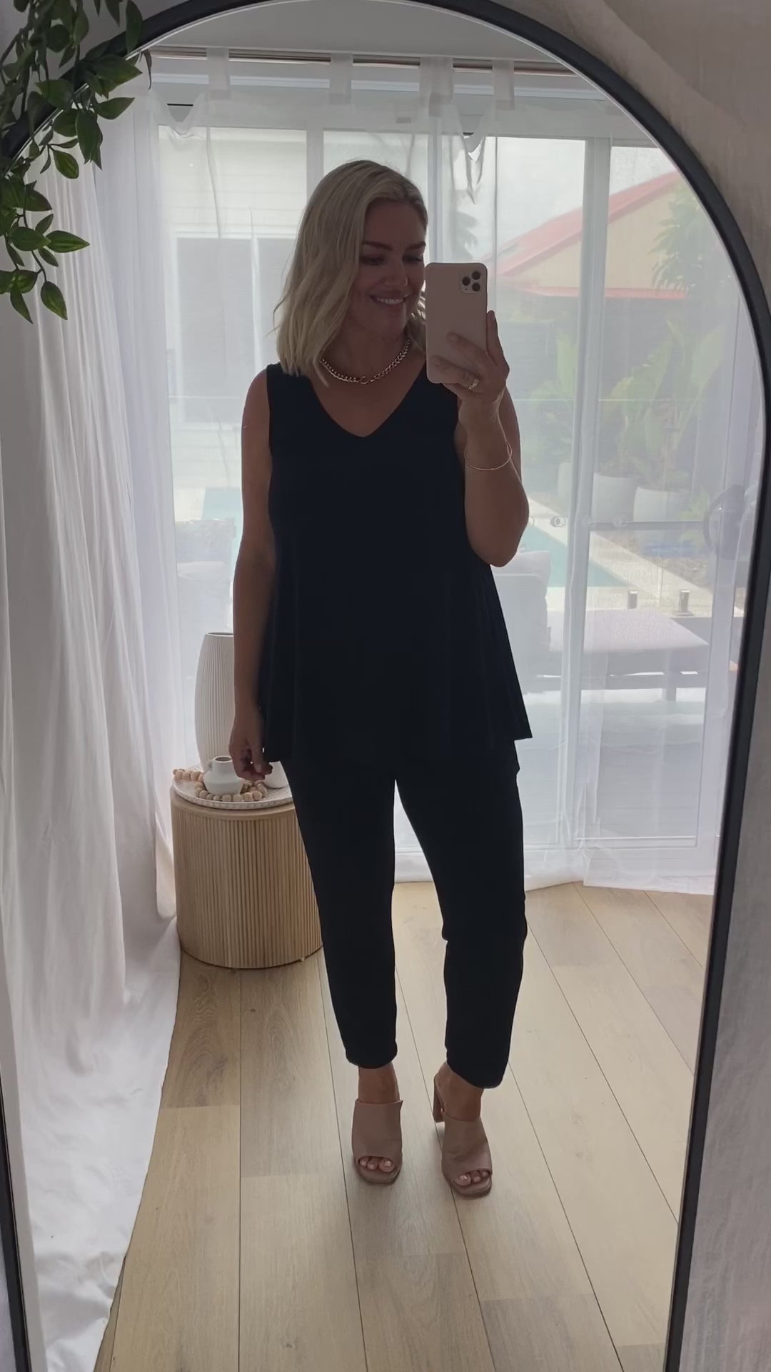 Sun Reversible Foundation Women's tank with scoop or V-neck in black.