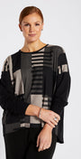 Woman wearing a black and gray patterned outfit on a white background