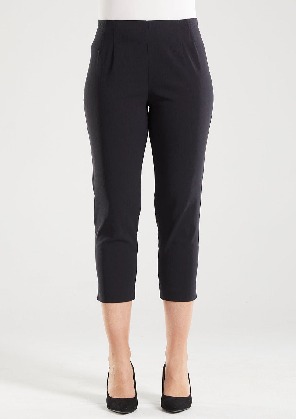 Adora is a Spring Summer 3/4 cropped black pant. Cut at calf length, with an easy comfortable pull on elastic waist and slim legs. Image is front  view of model. Philosophy Australia bengaline 3/4 length pant.