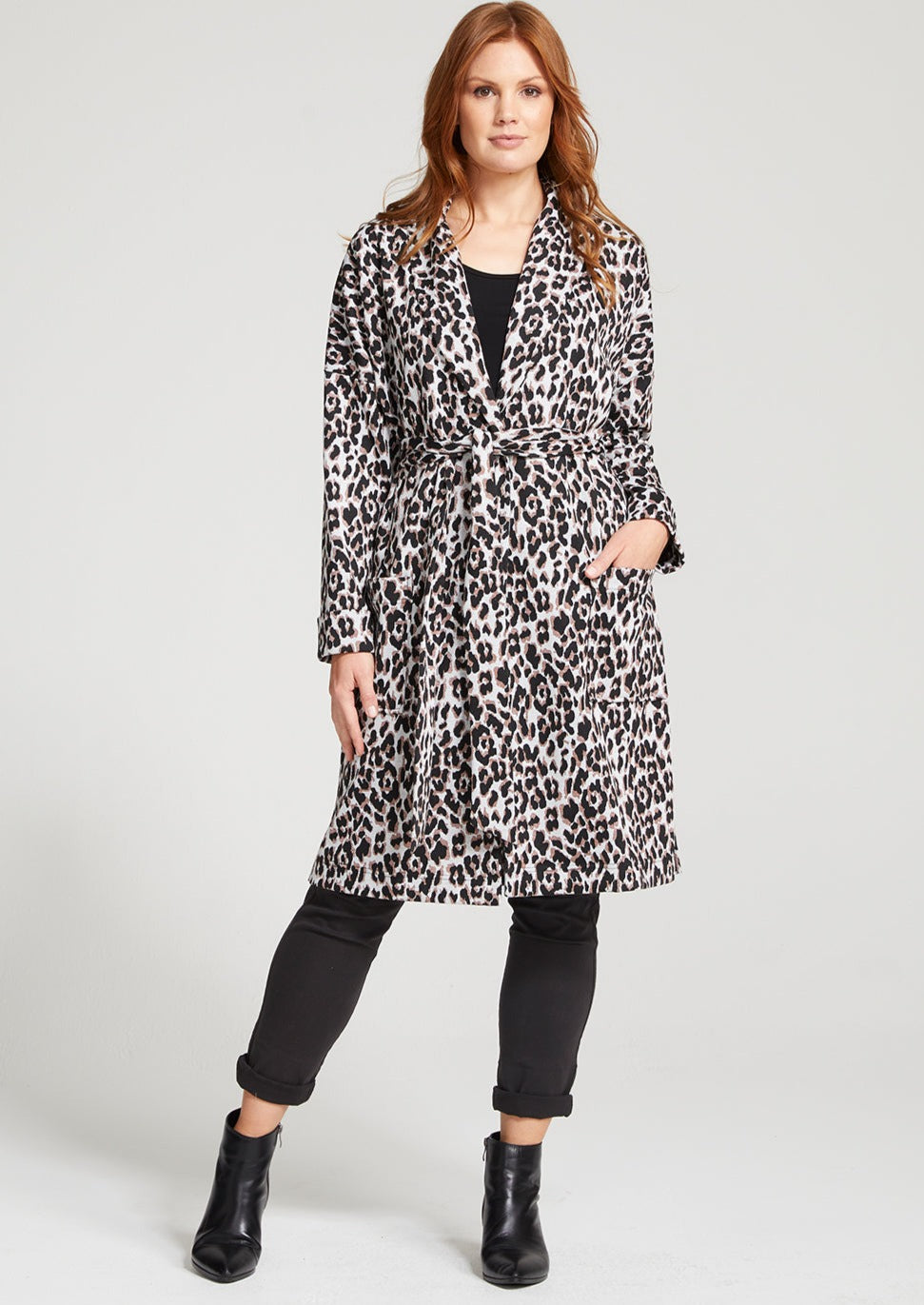 Robe style coat with centre front large black button to fasten or self tie belt. Large front patch pockets, full length sleeve, side split in hem. fabric is a jacquard, leopard ponte with lurex gold thread woven through. Made in Sydney, Australia by Philosophy Australia. 