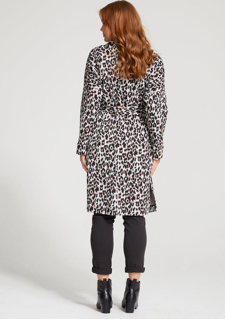 Robe style coat with centre front large black button to fasten or self tie belt. Large front patch pockets, full length sleeve, side split in hem. fabric is a jacquard, leopard ponte with lurex gold thread woven through. Made in Sydney, Australia by Philosophy Australia. 