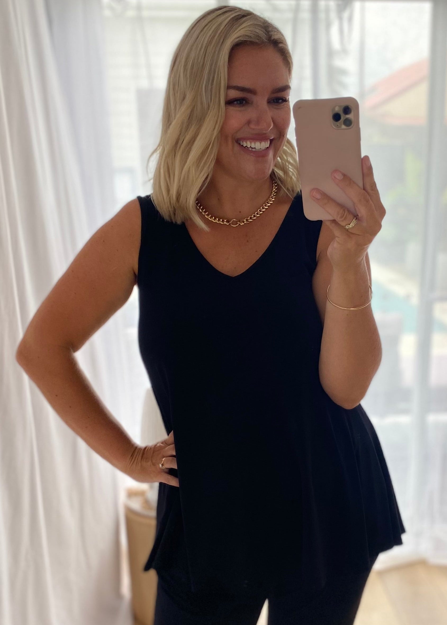 Sun Reversible Foundation Women's tank with scoop or V-neck in black.